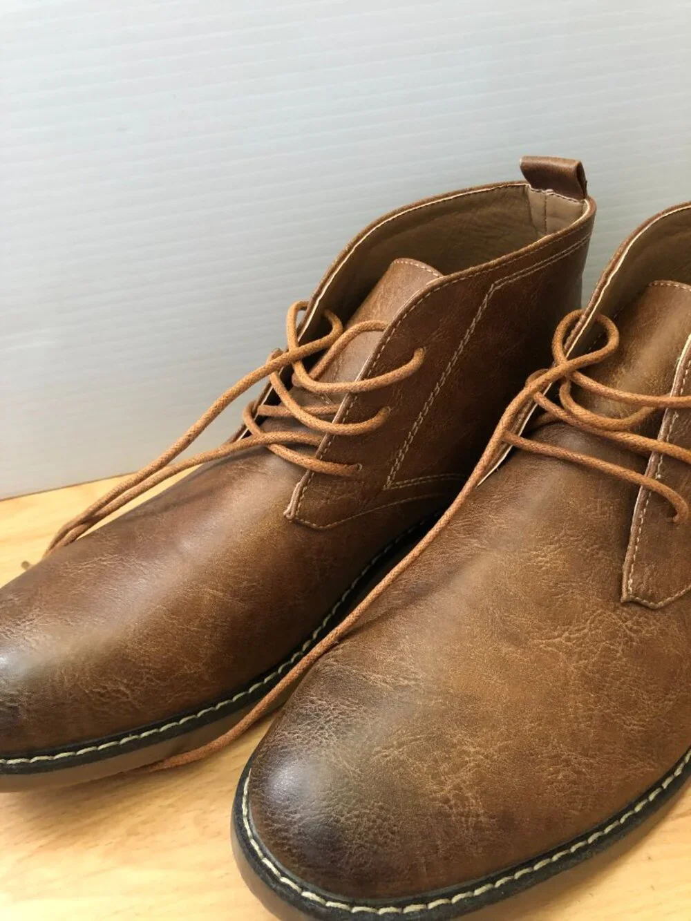 metro charm. Brown lace up booties